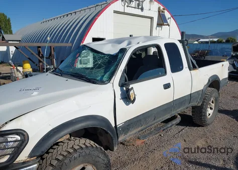 2002 Toyota Tacoma Base V6 из США, поврежденный, VIN 5TEWN72N32Z099946